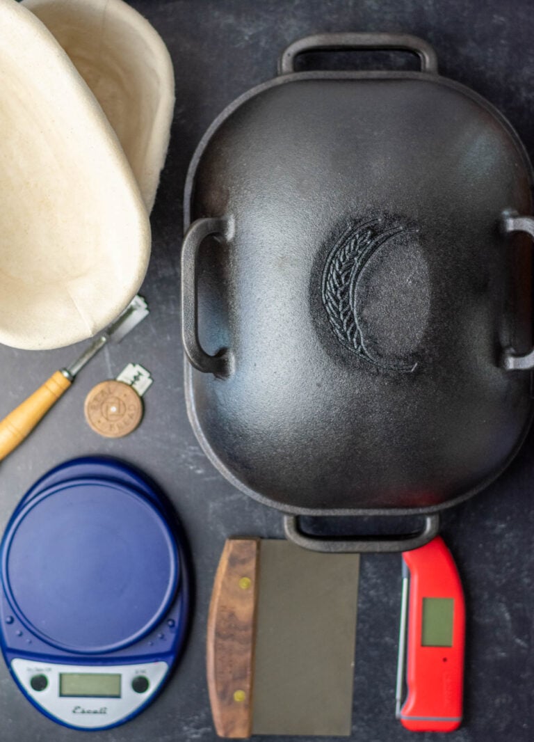 Tools needed to bake sourdough bread including Challenger Bread Pan, Thermapen, Bench Scraper, Scale, Bread Lames, and Bannetons