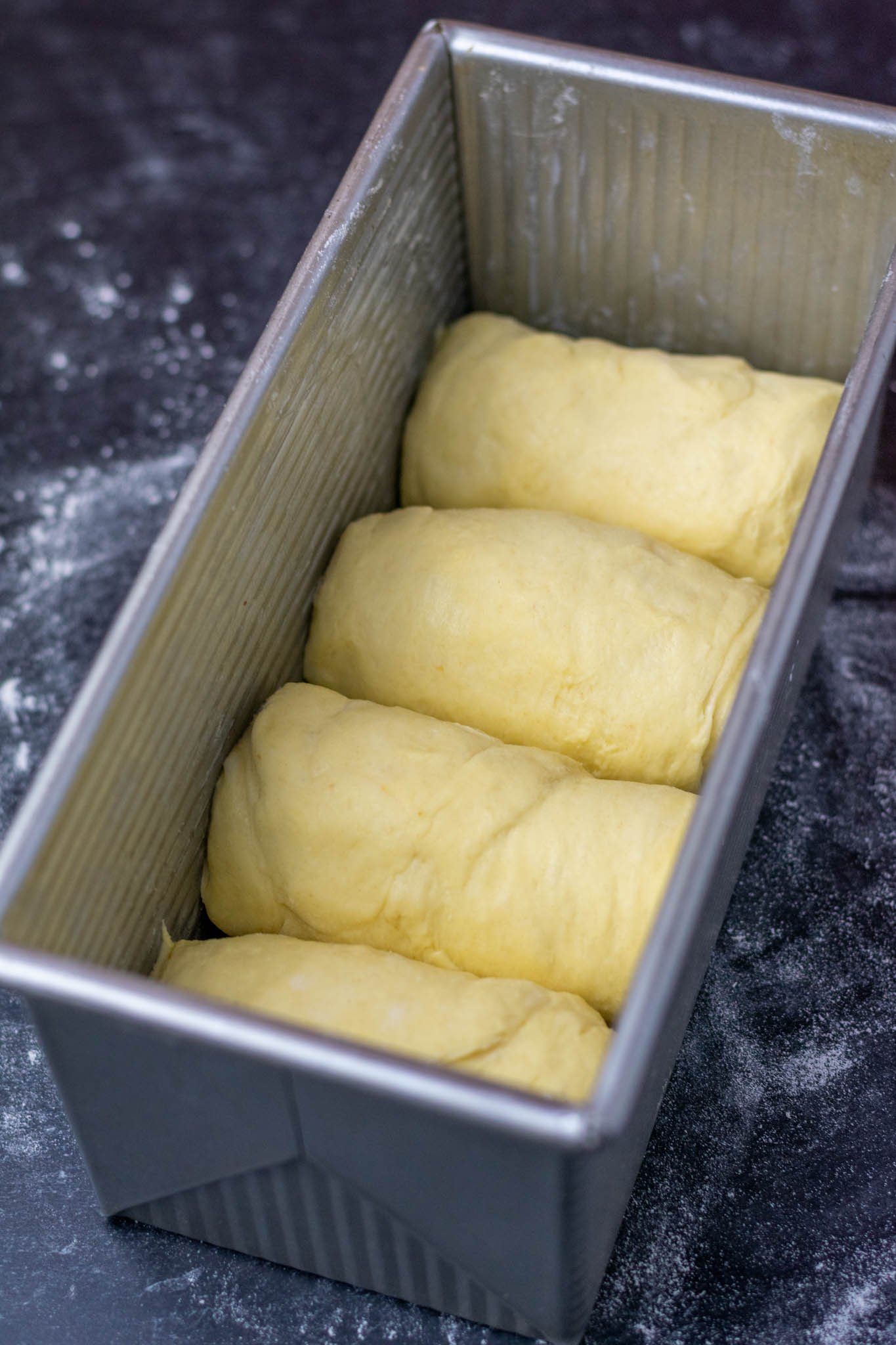 Overhead angle of brioche dough in pan at start of proof