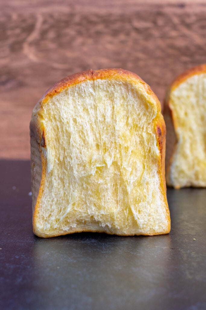 Portrait of sourdough brioche slice on table