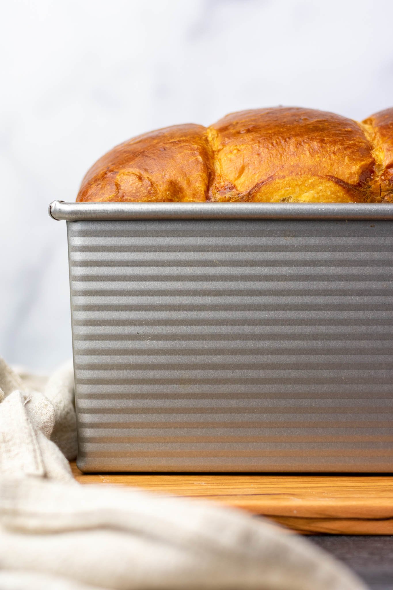 Upclose portrait of sourdough brioche in pan