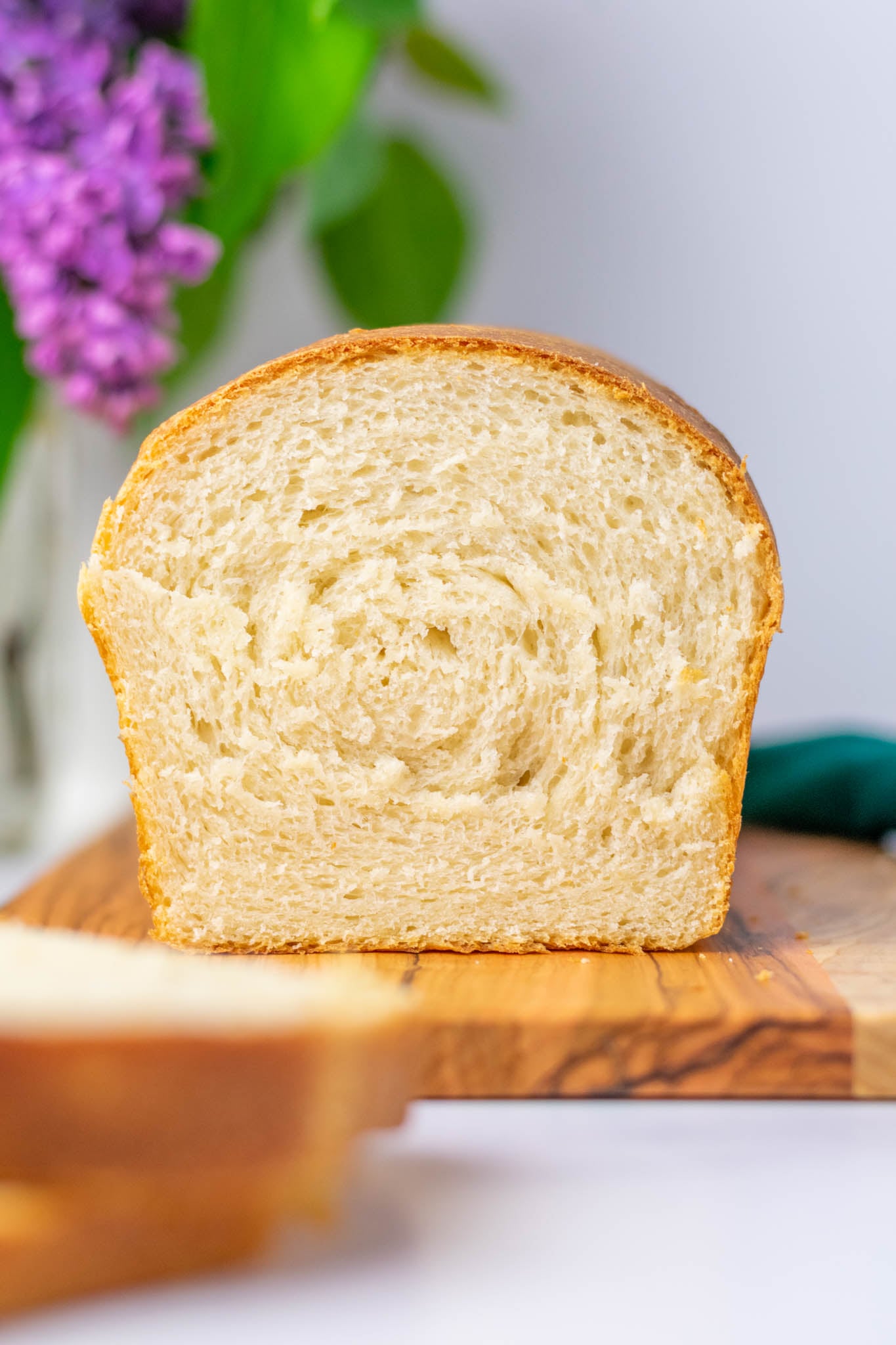 Crumb shot of sourdough sandwich bread on platter