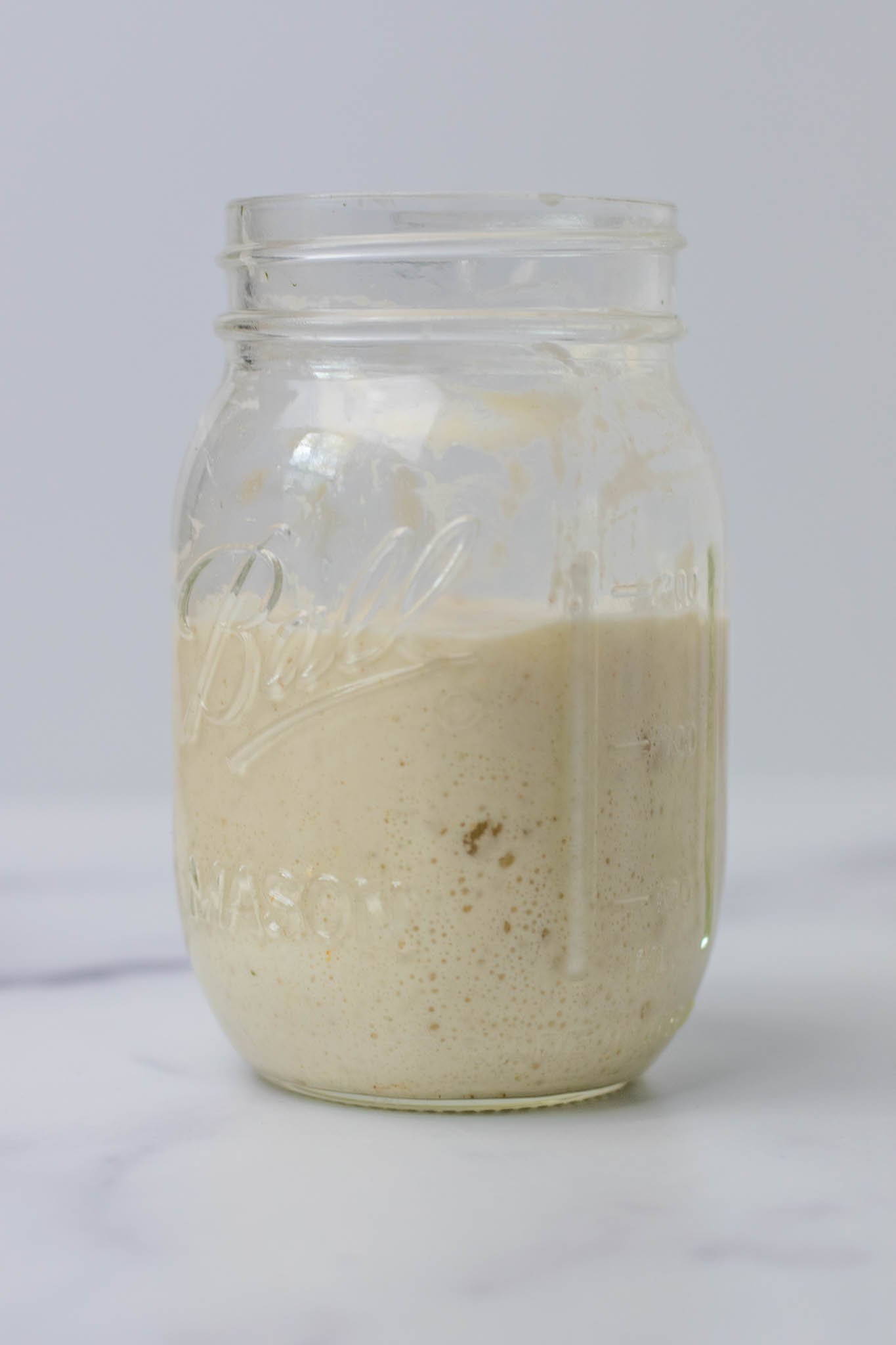 Ripe sourdough levain in mason jar