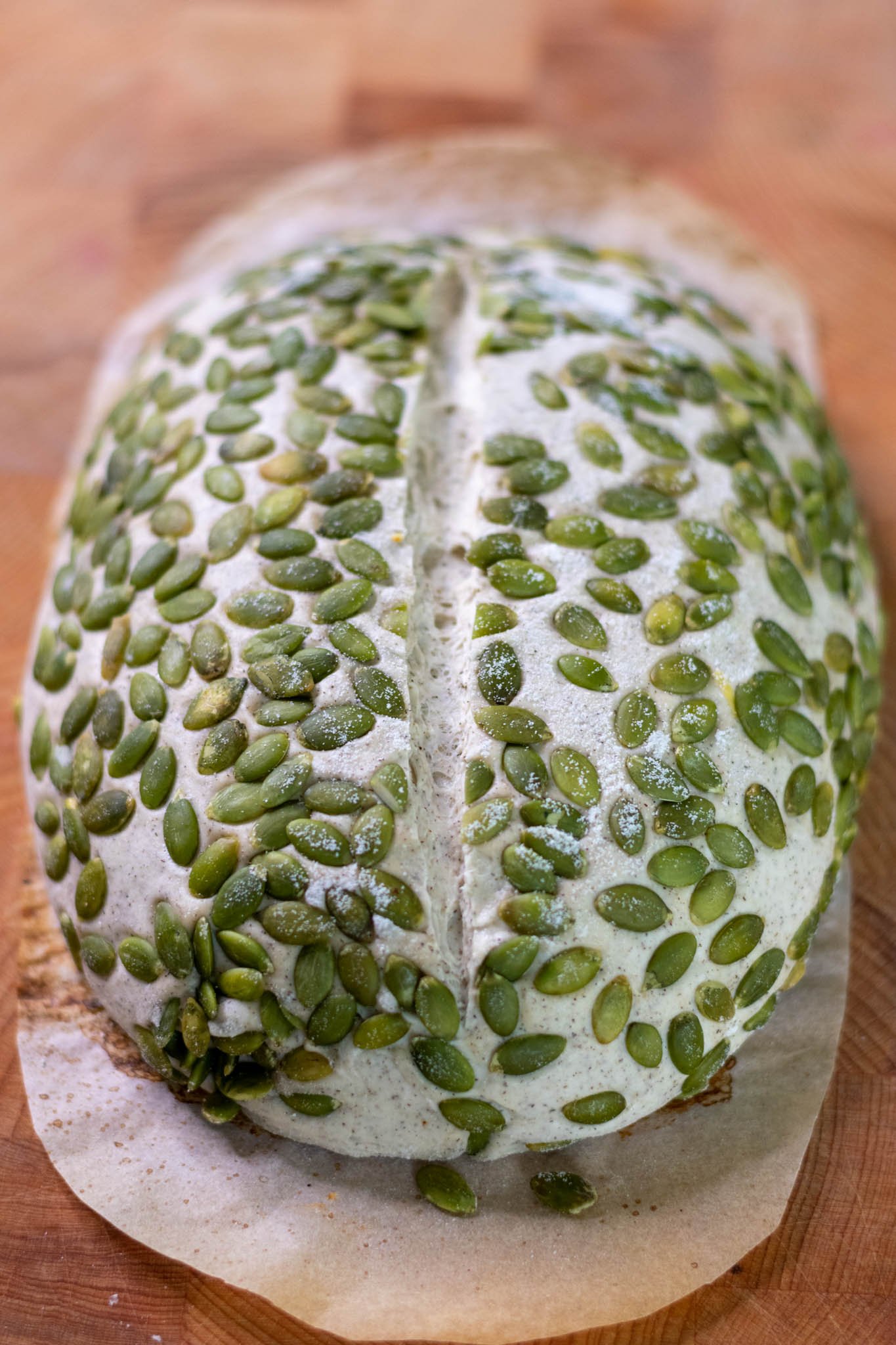 Scored buckwheat sourdough with pumpkin seeds