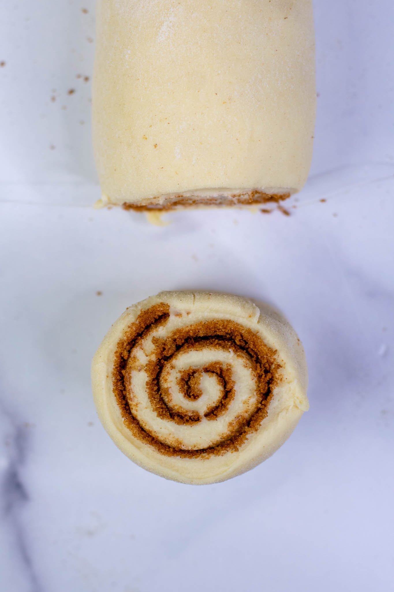 A cut swirl from a Sourdough cinnamon rolls after slicing