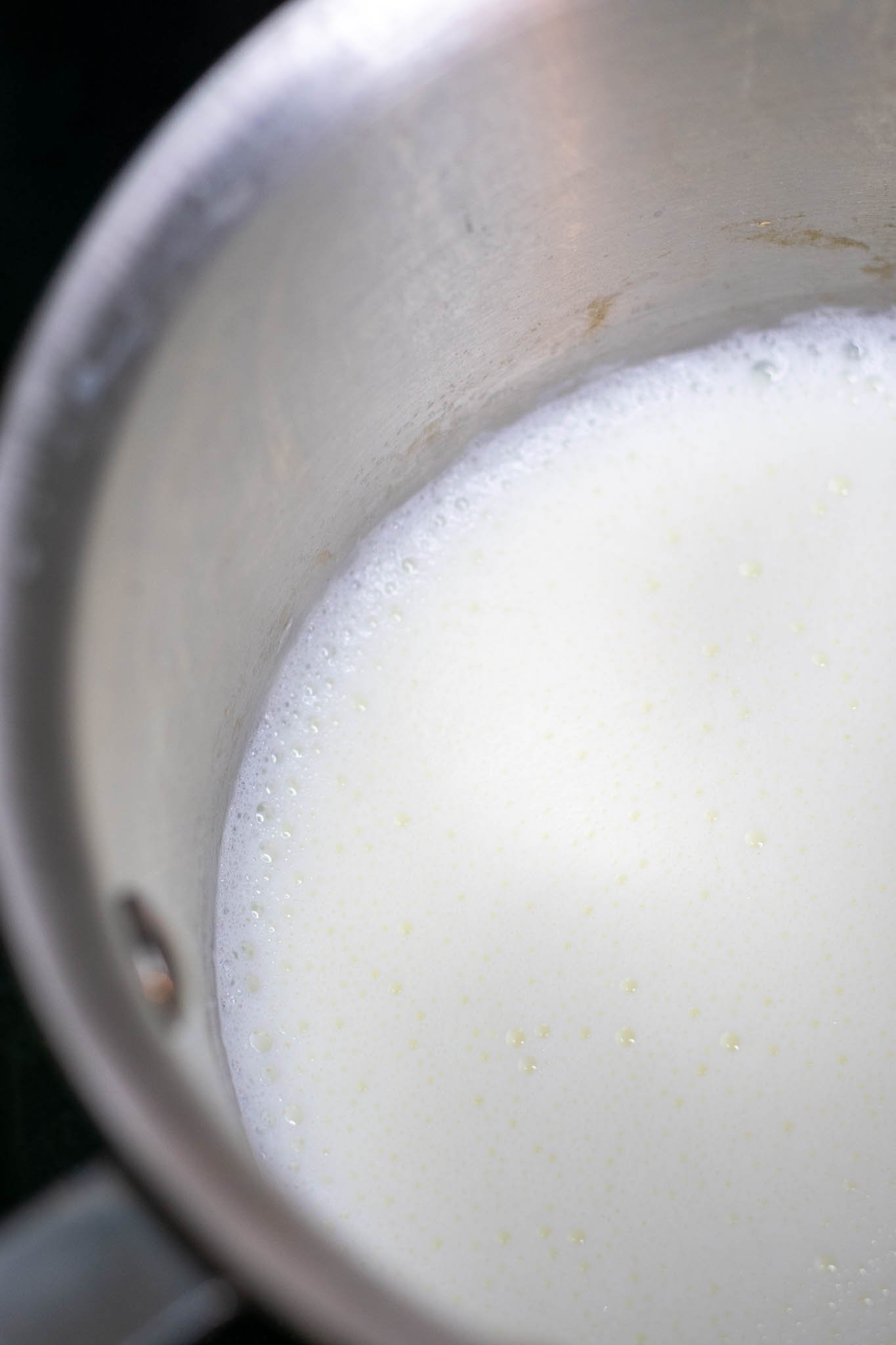 Scalding milk in saucepan