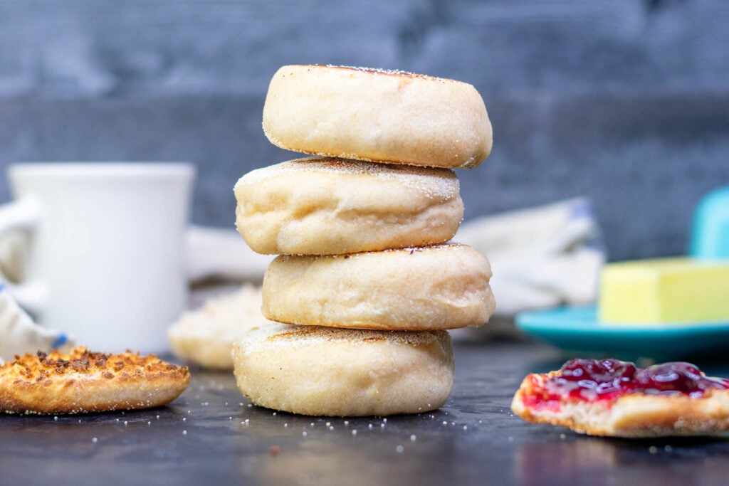 Sourdough English Muffins stacked and toasted with jam