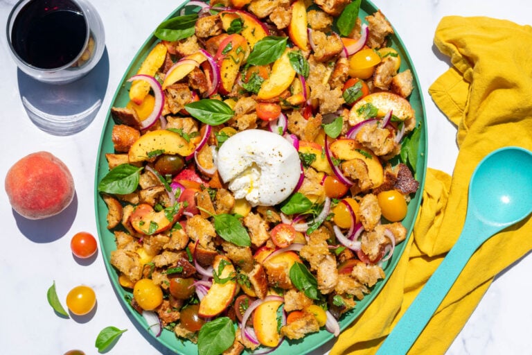 Sourdough Panzanella with Peaches and Burrata on a platter