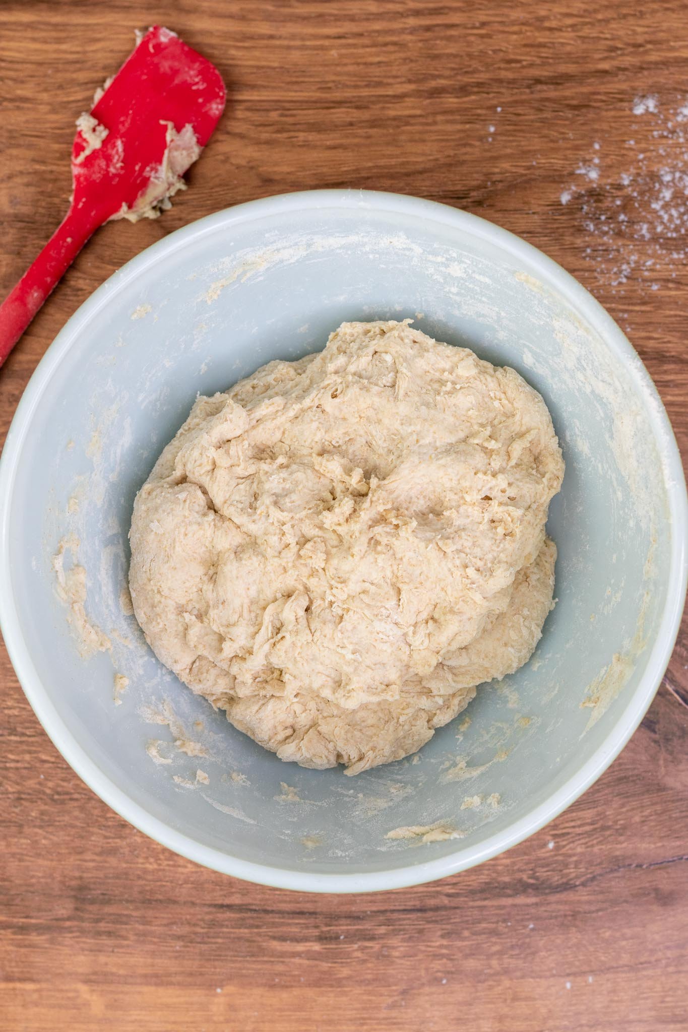Mixed dough in bowl resting during autolyse
