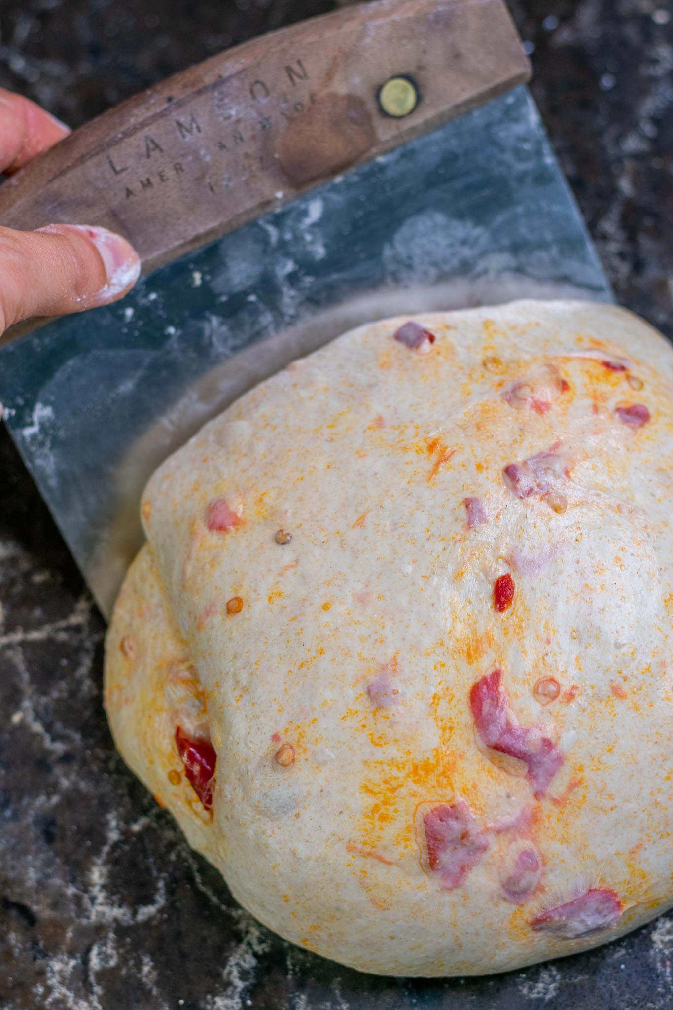 Shaping sourdough with bench scraper