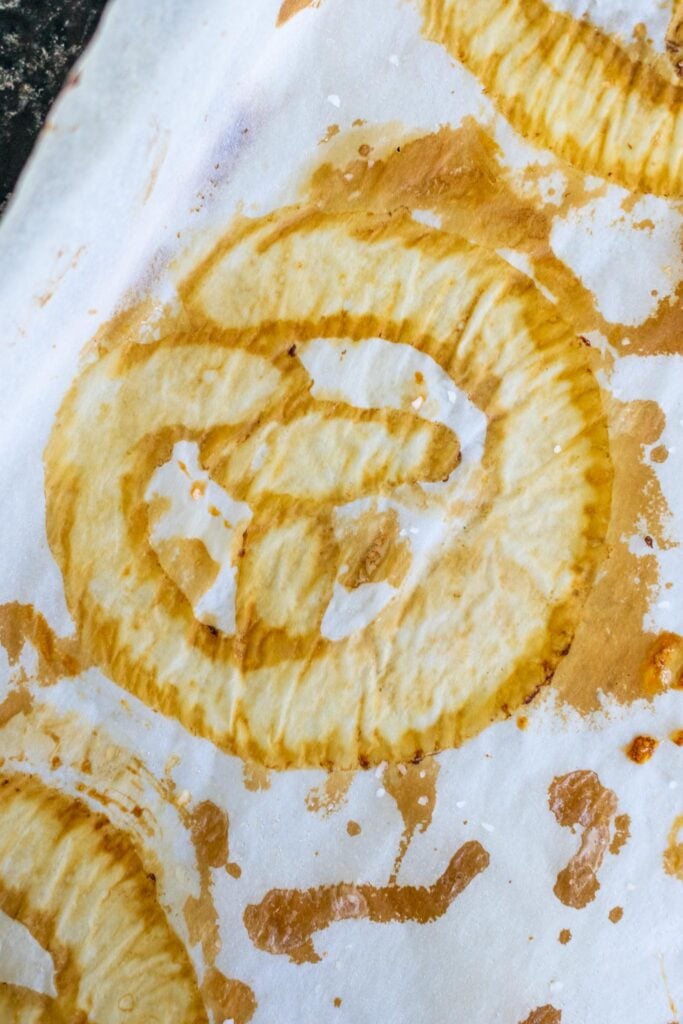An imprint of sourdough pretzels on parchment paper