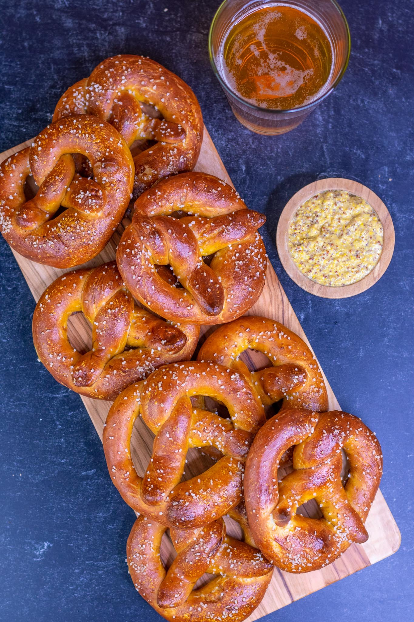 Platter of soft sourdough pretzels with mustard