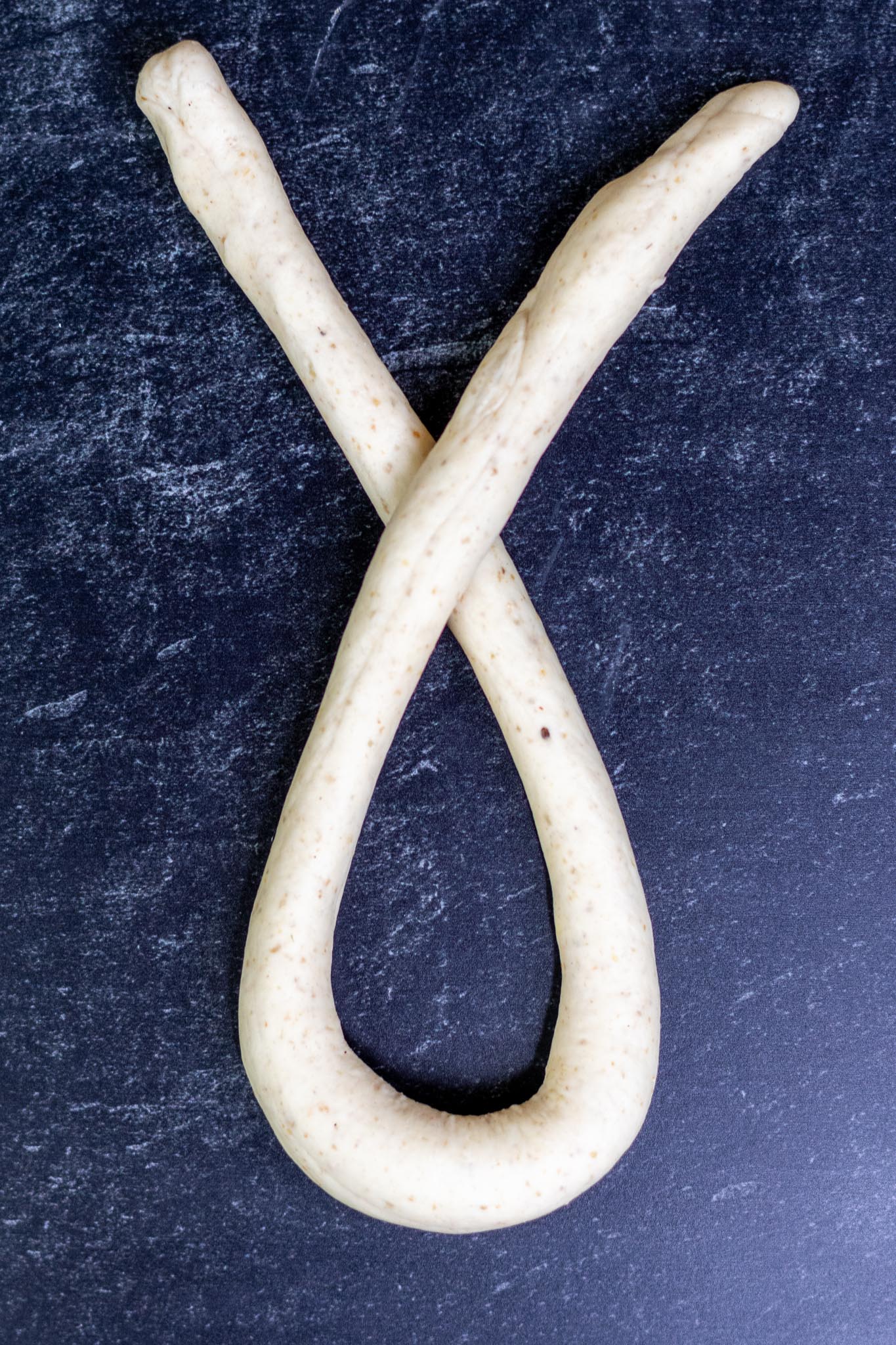 Crossing sourdough pretzel rope ends when shaping