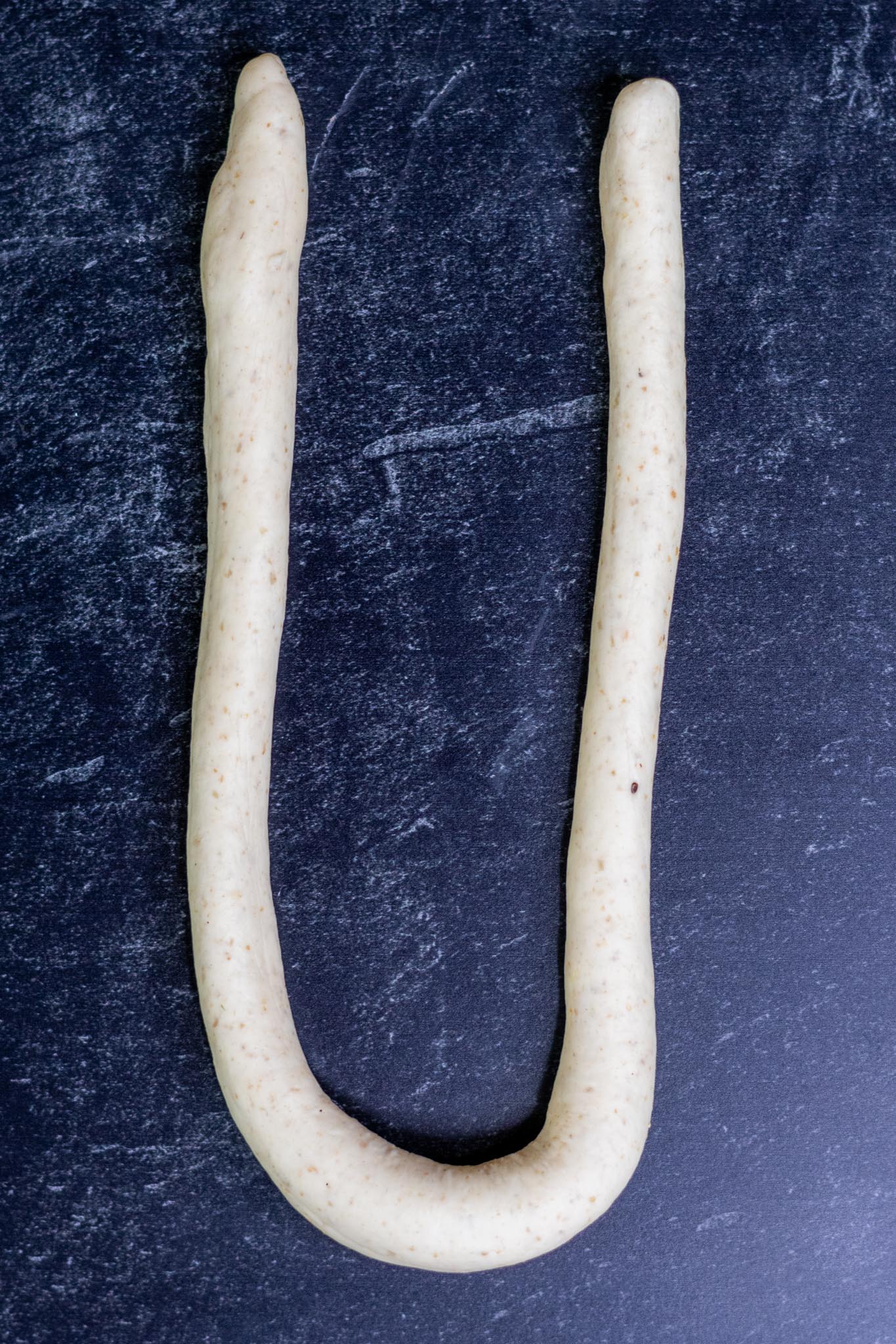 Shaping a sourdough pretzel shaped into a Uo
