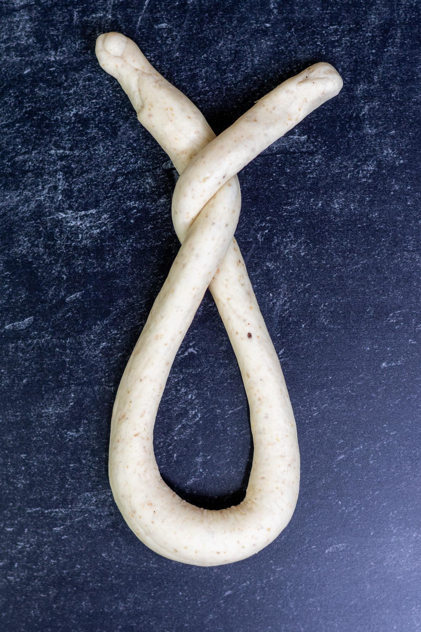 Twisting sourdough pretzel rope ends when shaping