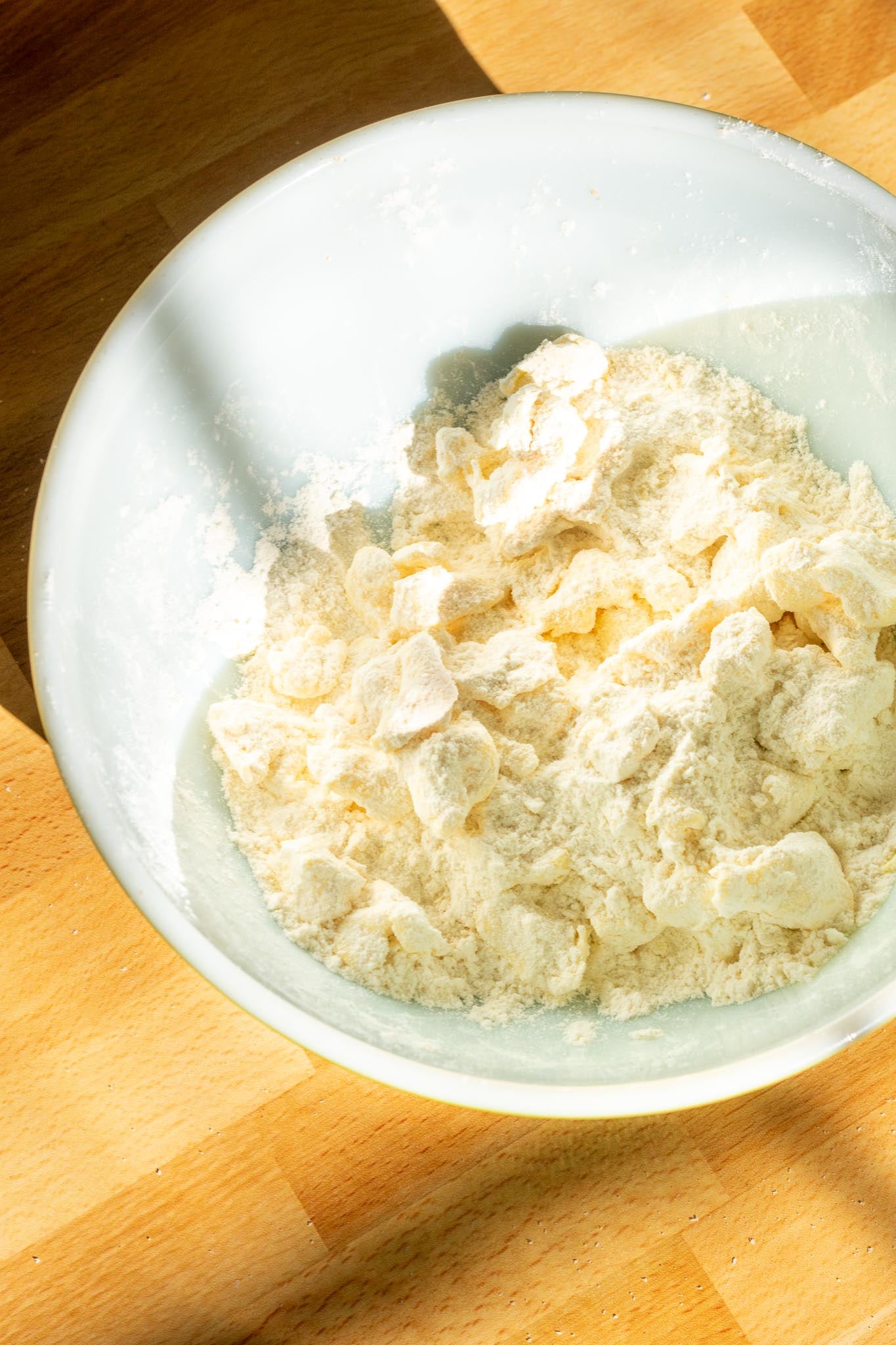 Butter mixed in mixing bowl with flour