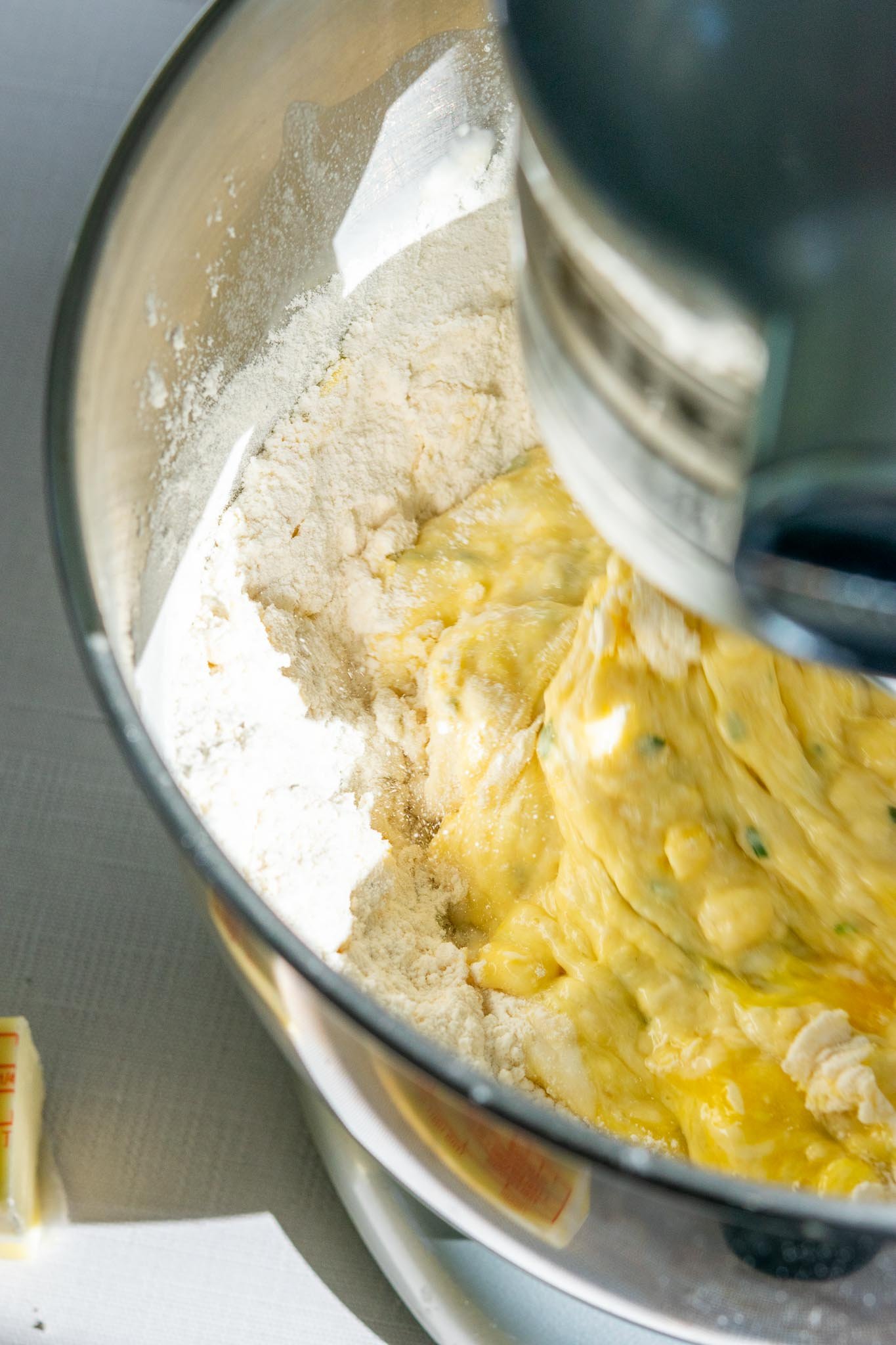 Starting to mix sourdough dinner roll dough in a stand mixer