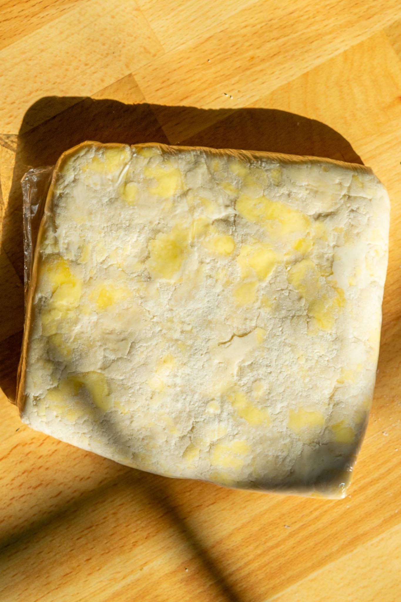 Sourdough Pie Crust wrapped in plastic wrap