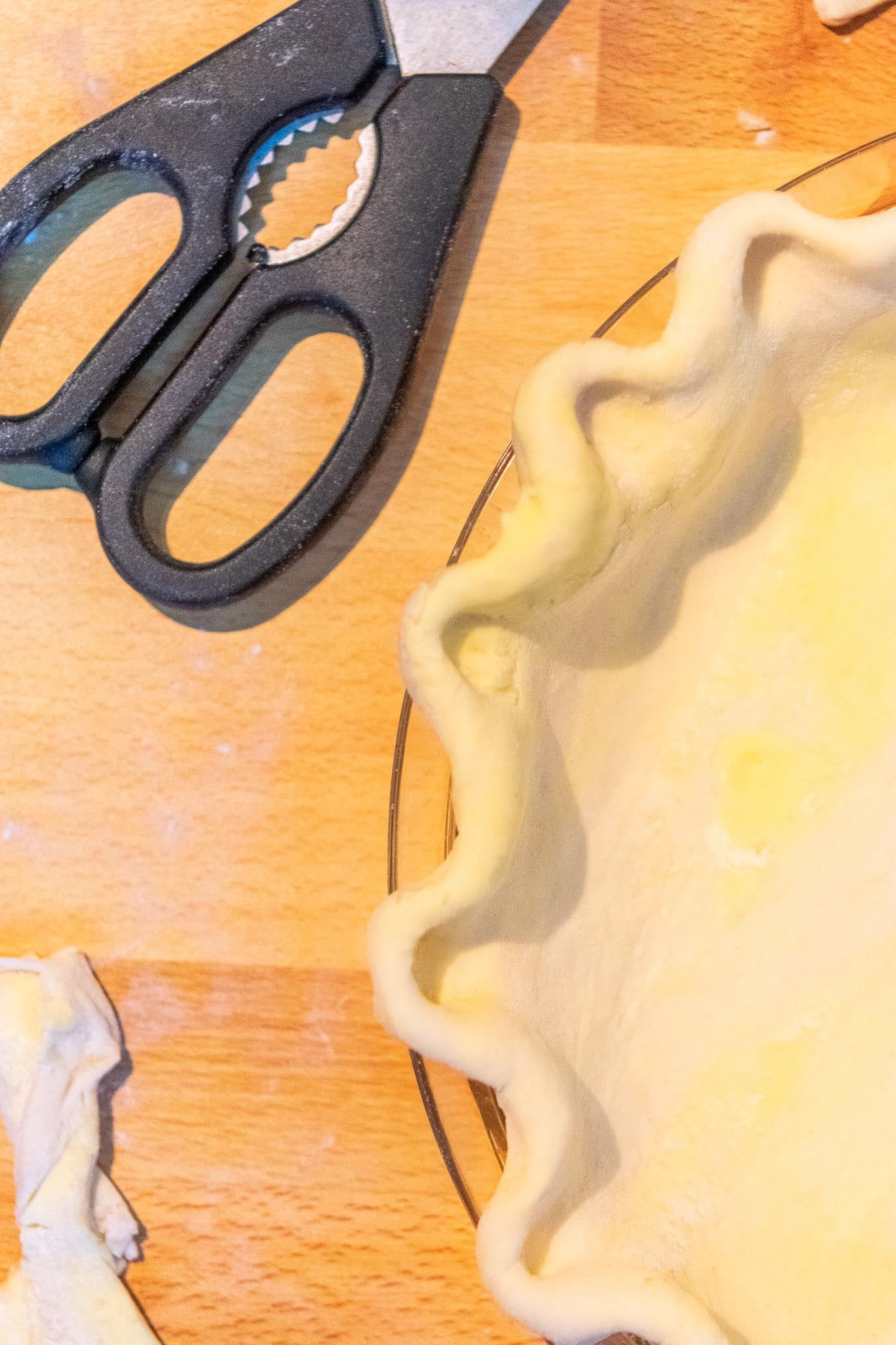 Sourdough pie crust crimped edges with kitchen shears