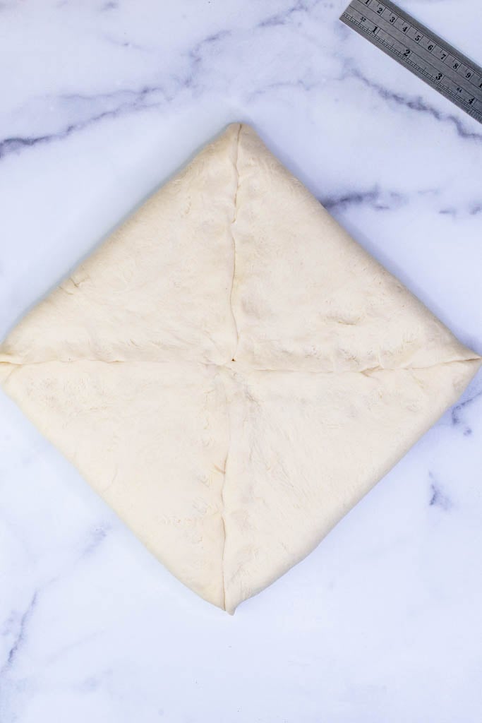 Butter block encased in croissant dough