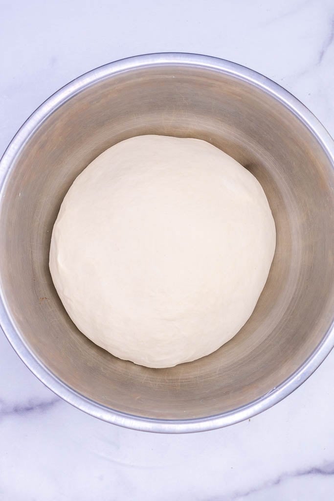 Detrempe or croissant dough in bowl at the start of bulk fermentation