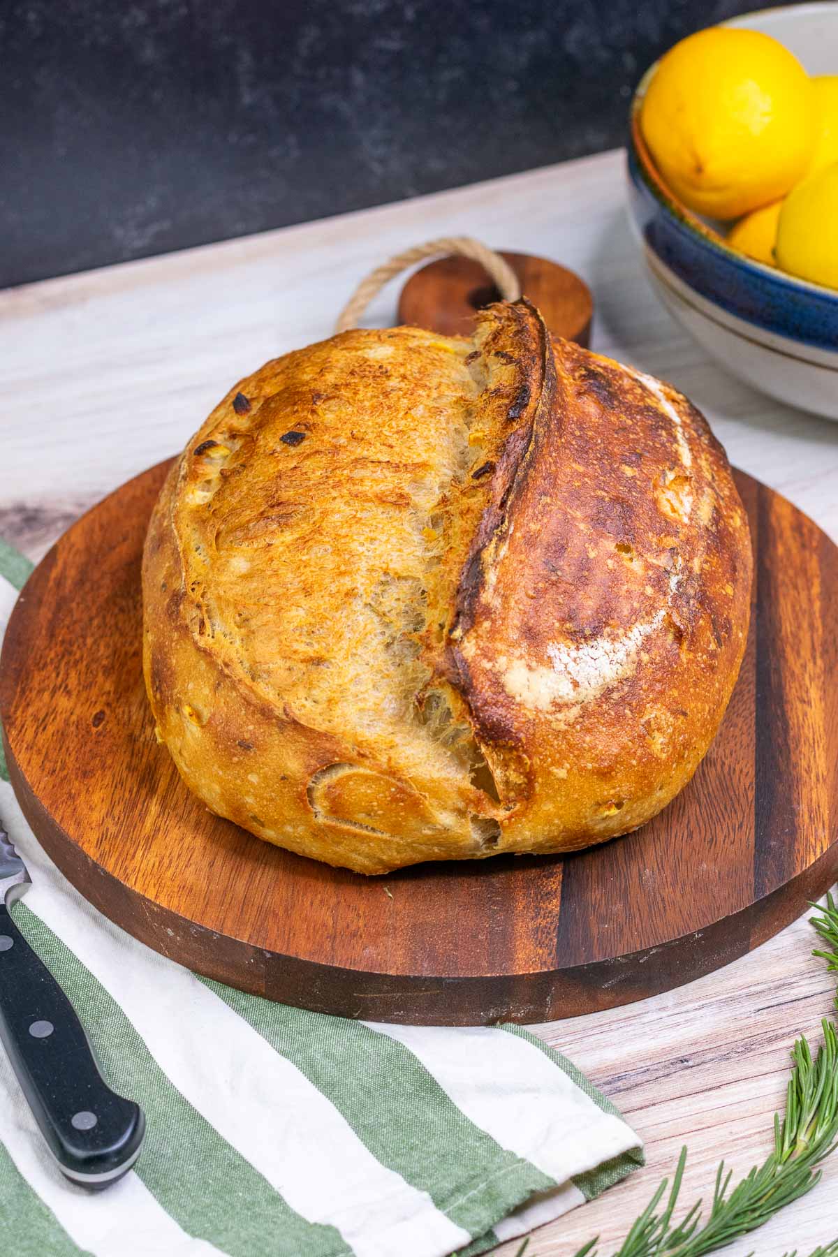 Lemon and rosemary bread baked on a cutting board