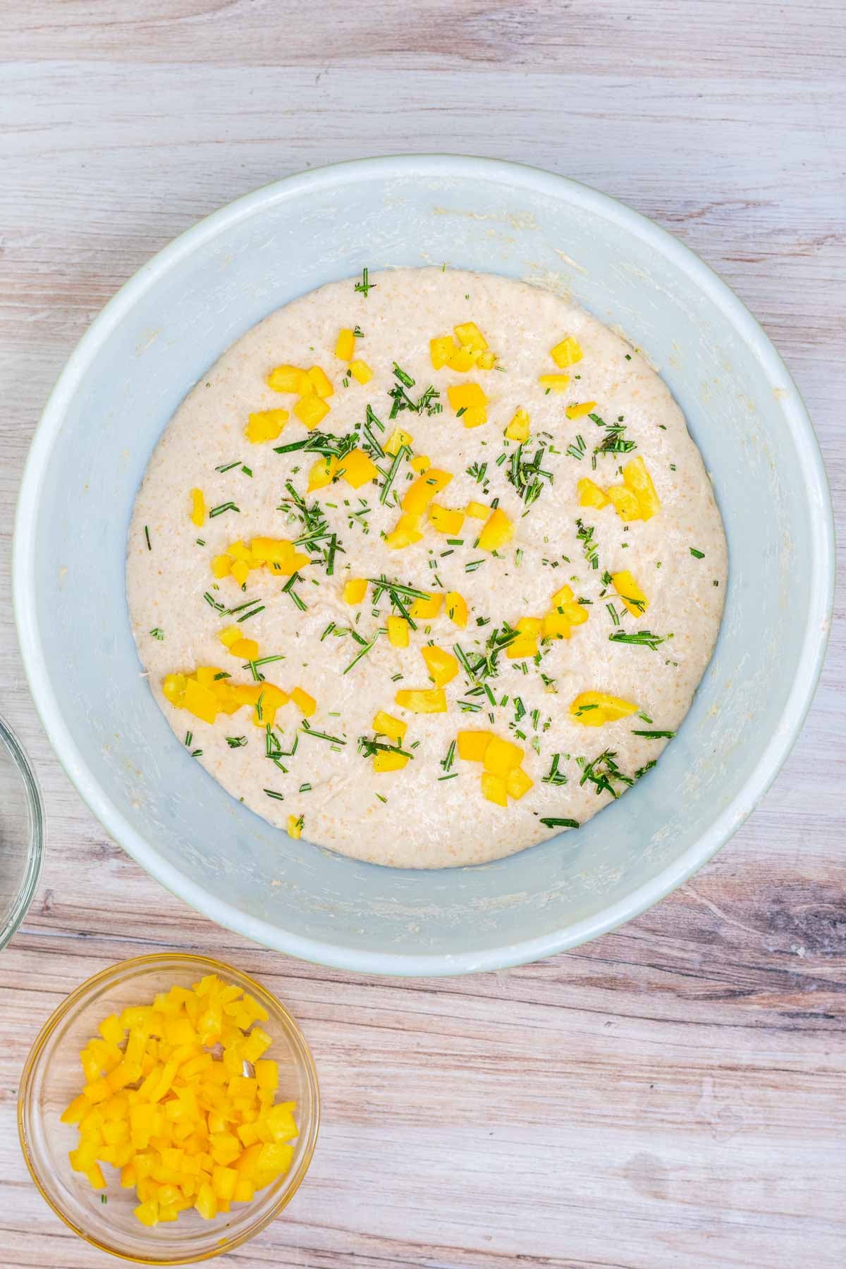 Preserved lemons and rosemary on top of dough