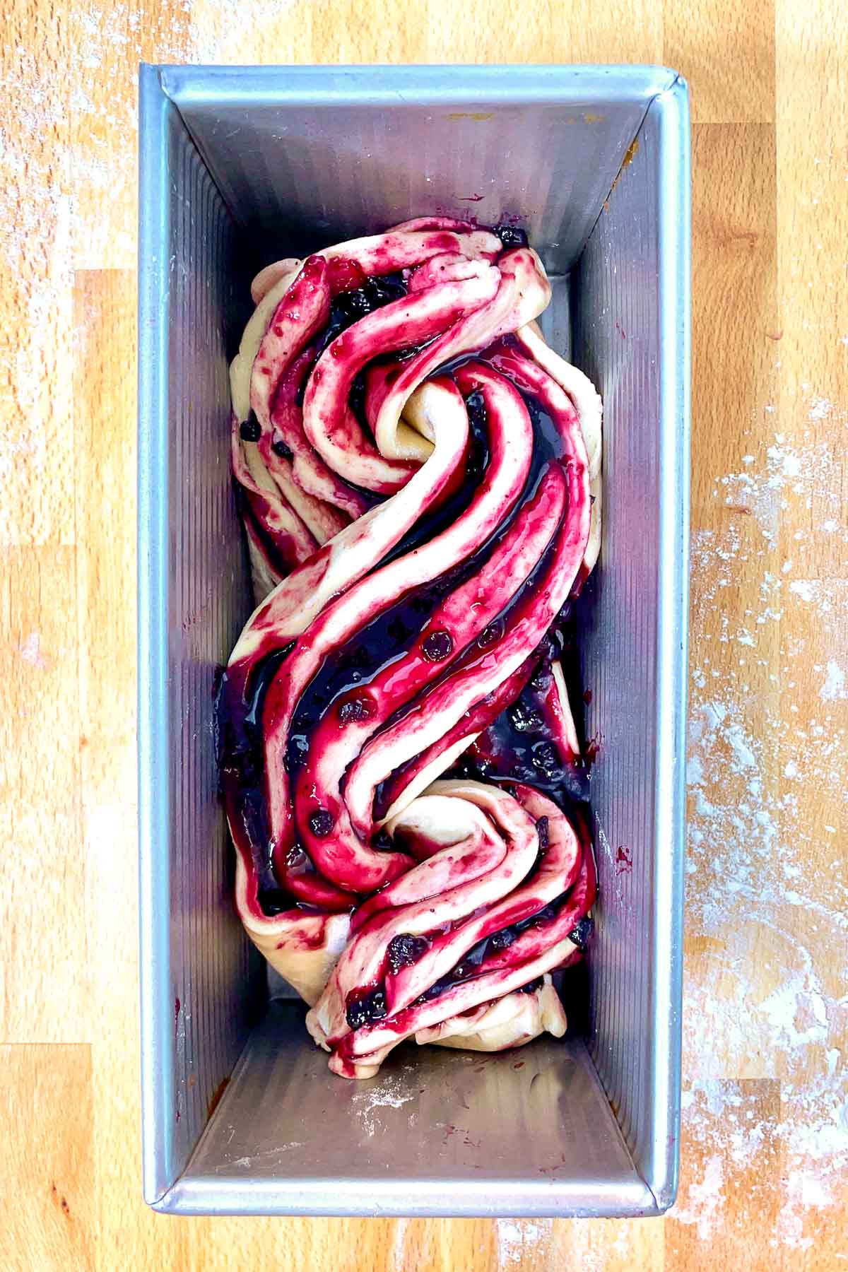 Braided Sourdough babka in pan at the start of proofing