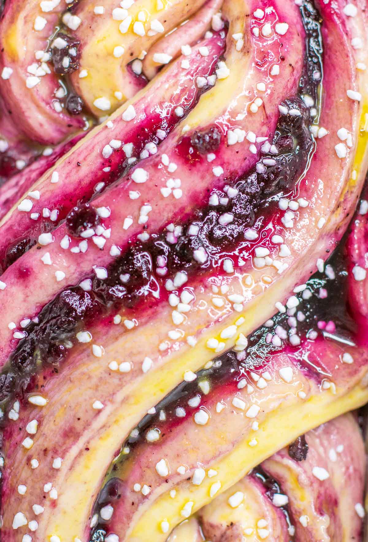 Close up of Sourdough babka with blueberry jam before baking