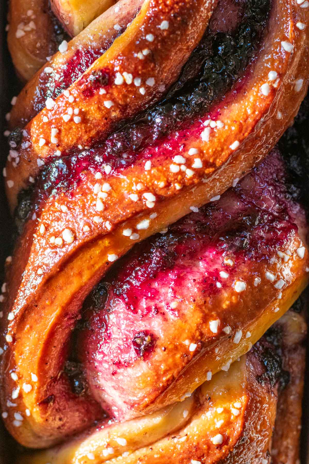 Close up of Sourdough babka with blueberry jam after baking