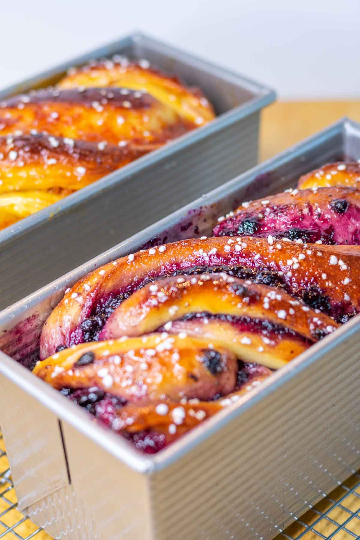 Two sourdough babkas with  jams in loaf pans