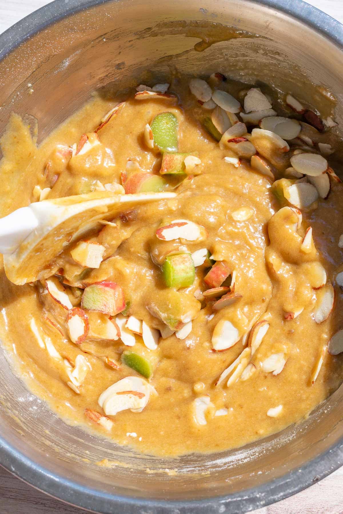 Mixing rhubarb and almonds into blondie batter
