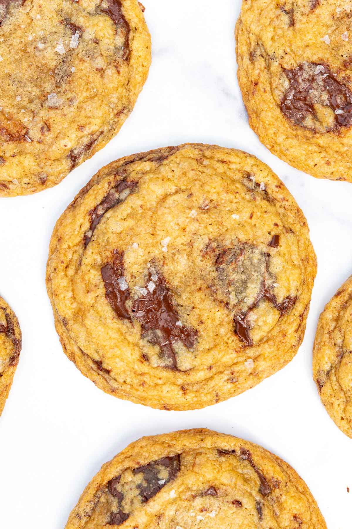 Sourdough Discard Chocolate Chip Cookies on a marble surface