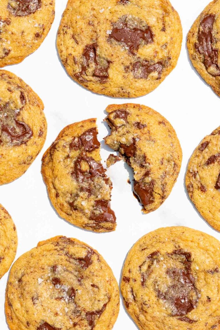 Gooey Sourdough Discard Chocolate Chip Cookies on a marble surface