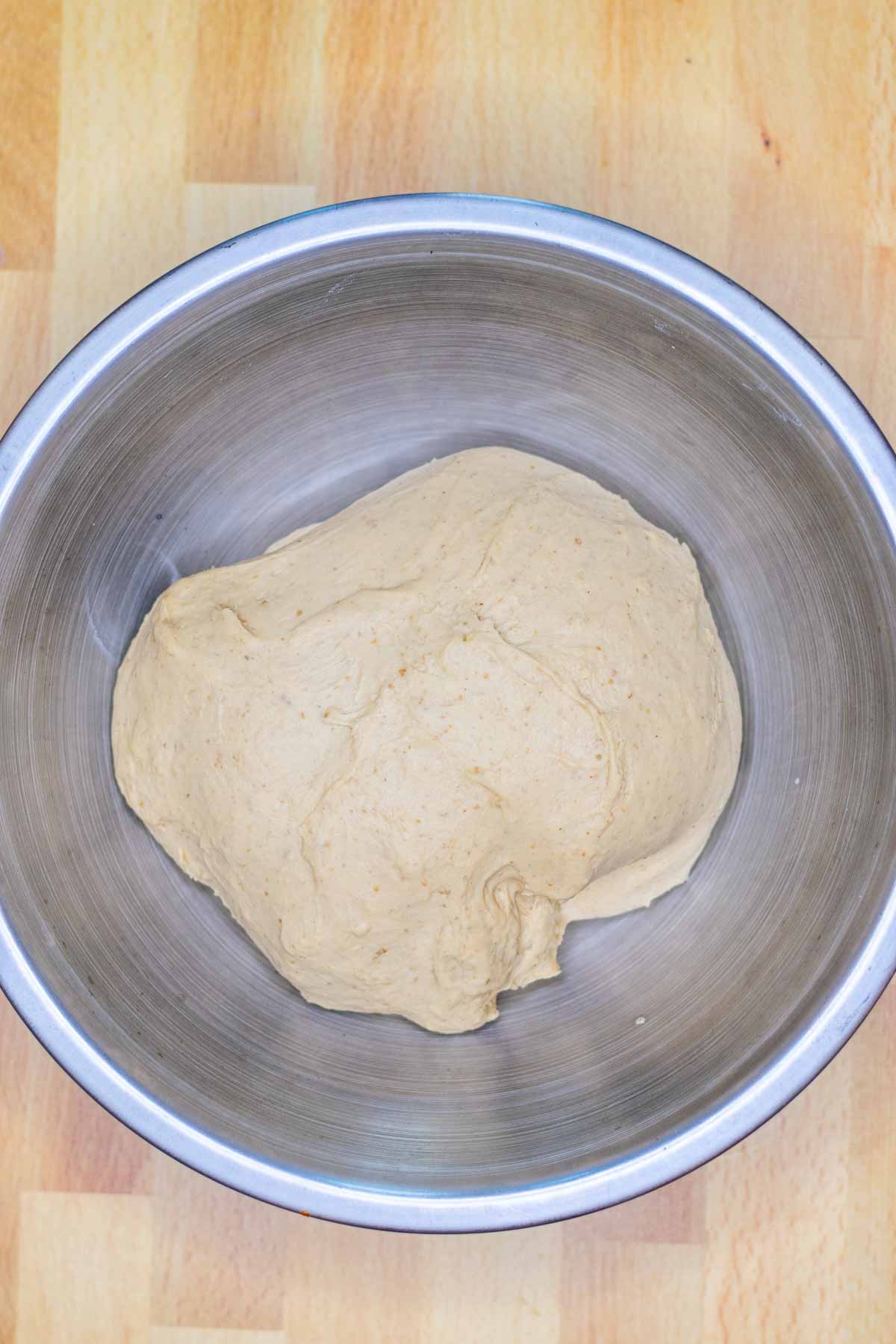 Sourdough bagel dough in bowl at the start of bulk fermentation