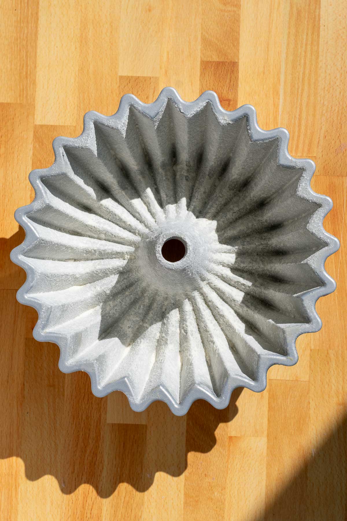 Prepared bundt pan with flour