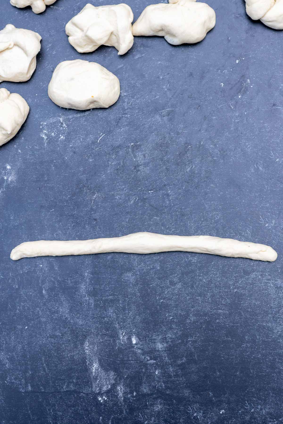 Sourdough garlic knot rolled into a rope