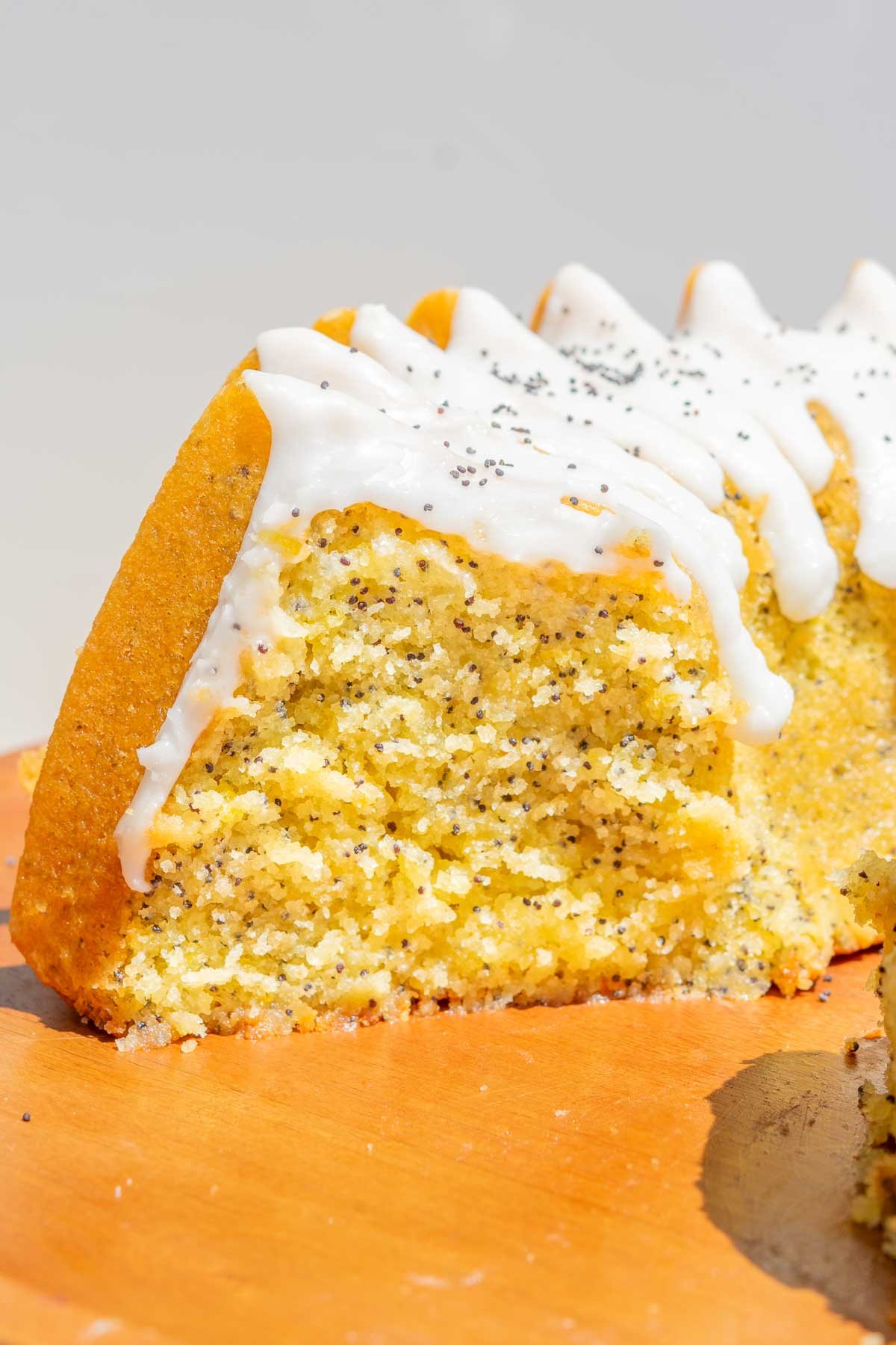 Interior texture of sourdough lemon poppy seed bundt cake with glaze