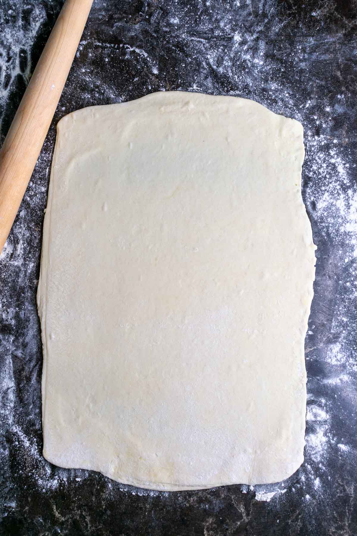 Sourdough rough puff pastry rolled out into a large rectangle