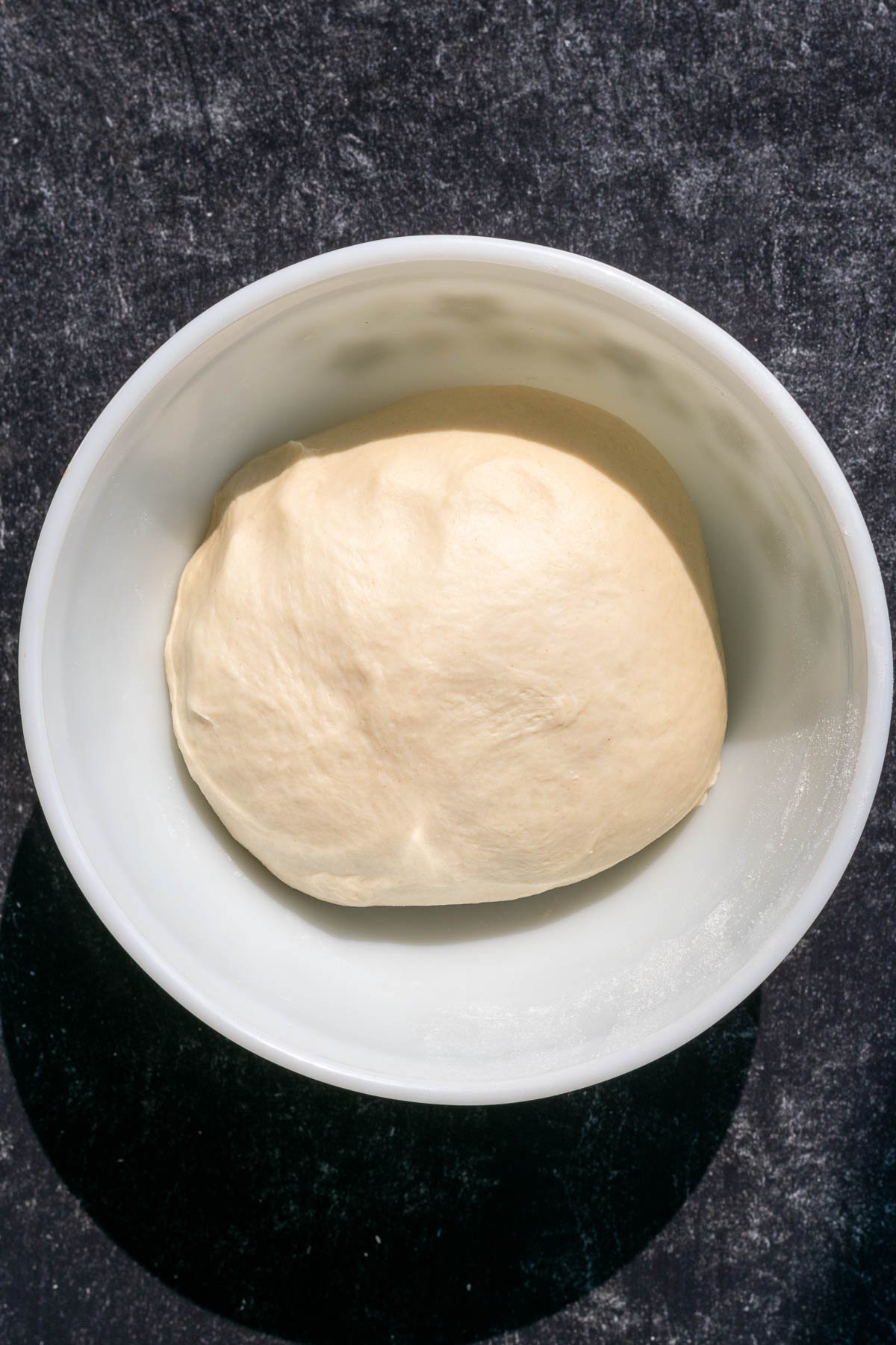 Sourdough garlic knot dough in bowl at the start of bulk fermentation