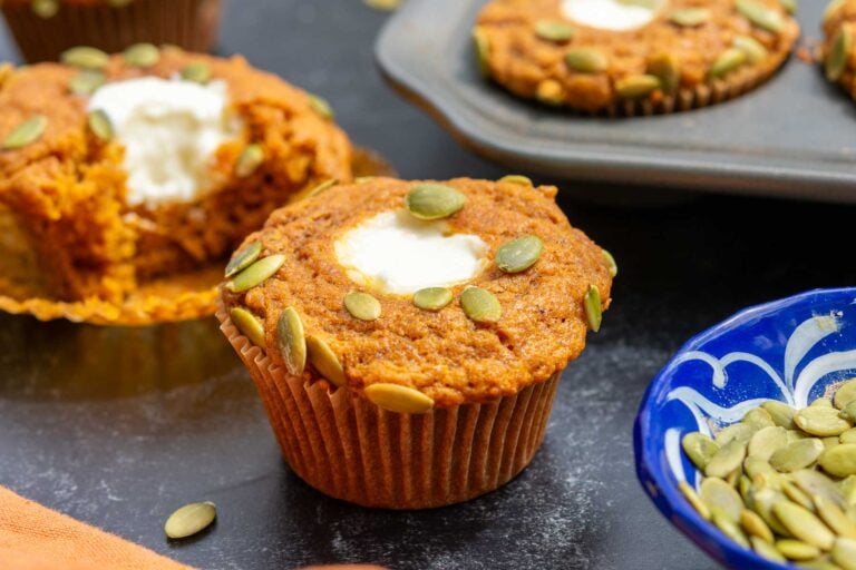 Sourdough Pumpkin Cream Cheese Muffins with pumpkin seeds