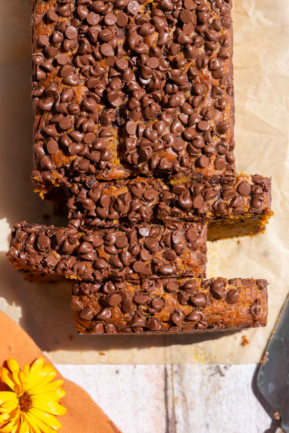 Cut slices of sourdough pumpkin chocolate chip bread.