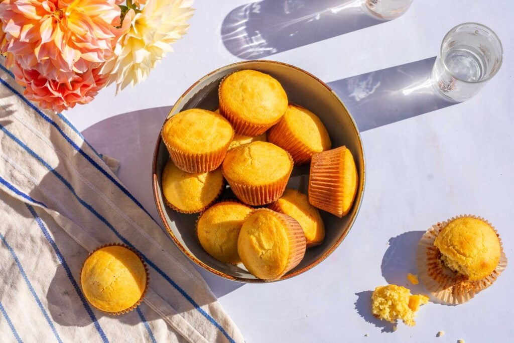 A bowl of sourdough corn muffins.