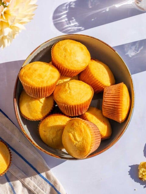 A bowl of sourdough corn muffins.