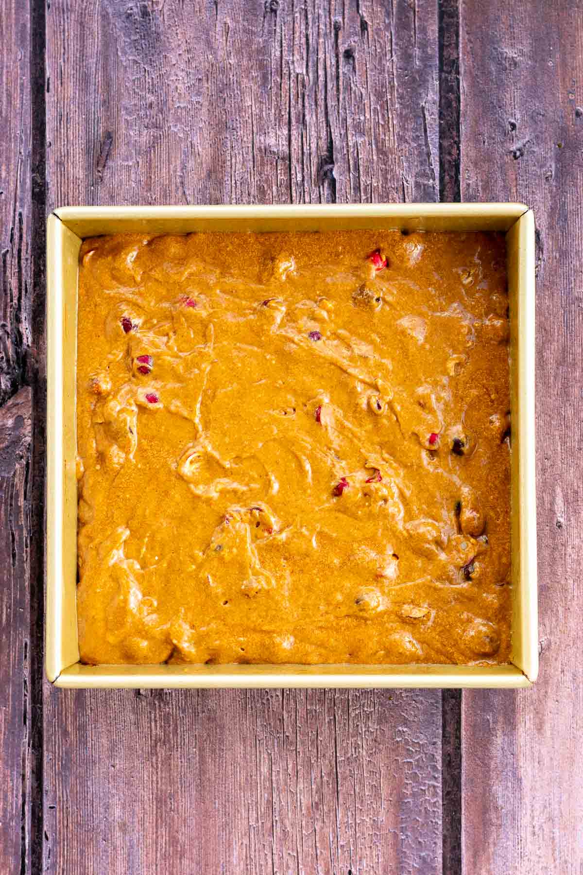 Sourdough gingerbread cake in a 9x9 baking pan unbaked.