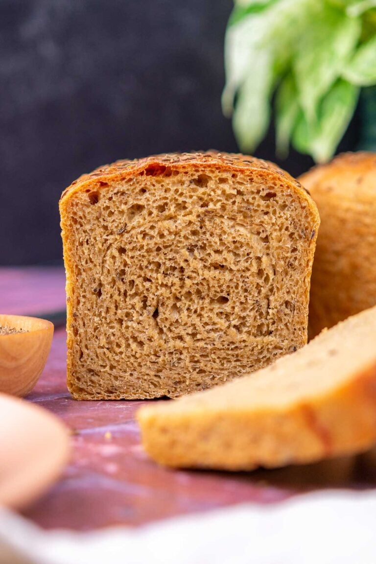 Interior crumb of a sliced soft Sourdough rye sandwich bread.