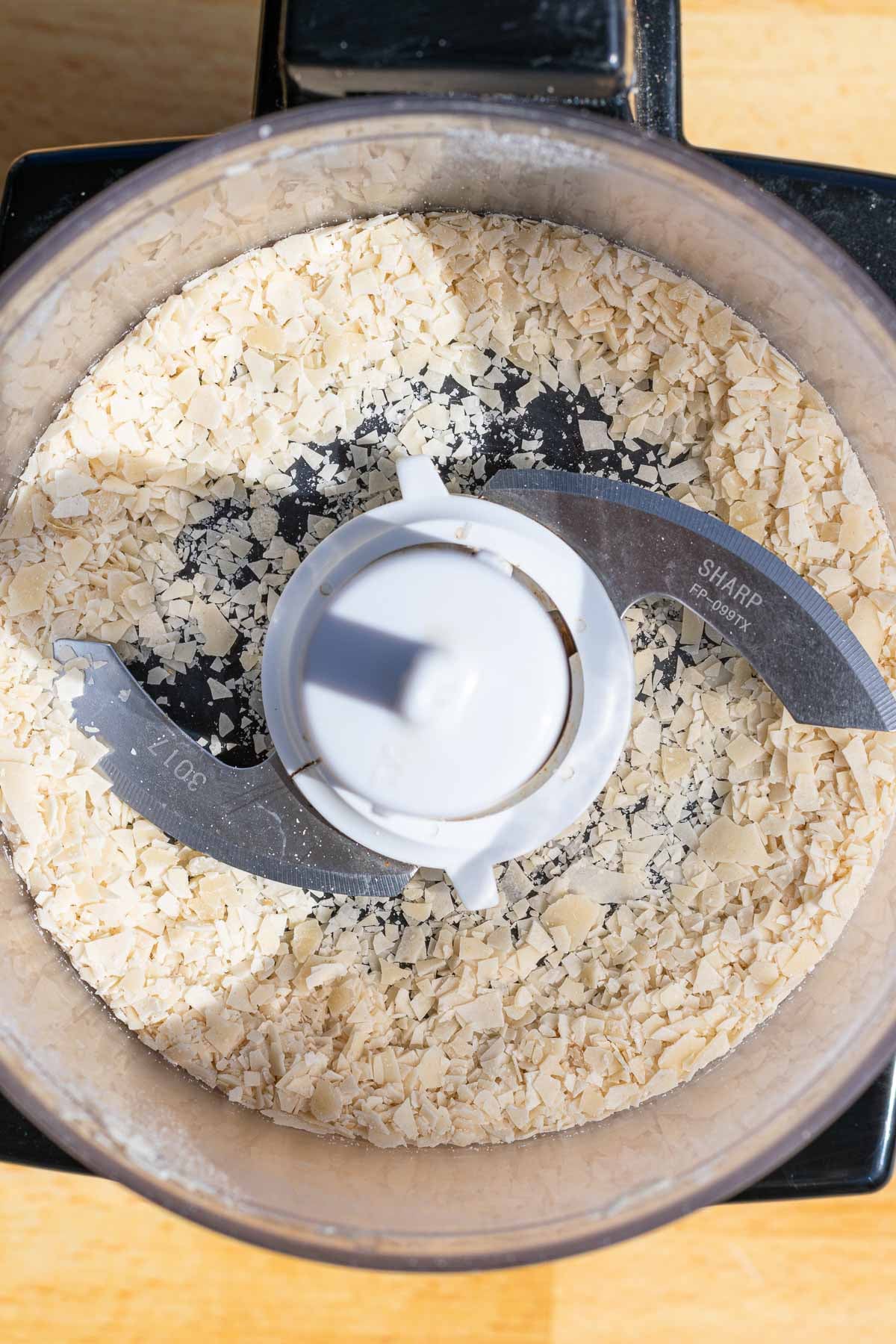 Ground dried sourdough starter in a food processor.