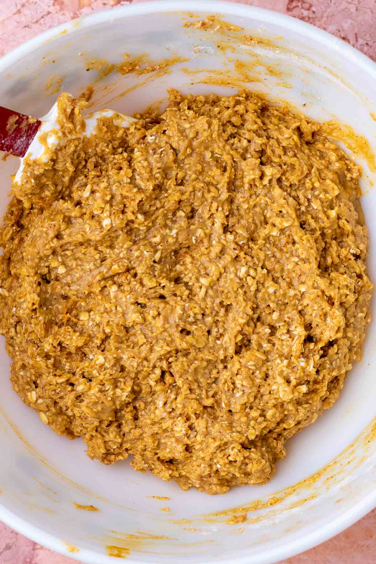 Bowl of mixed sourdough oatmeal cookie batter.