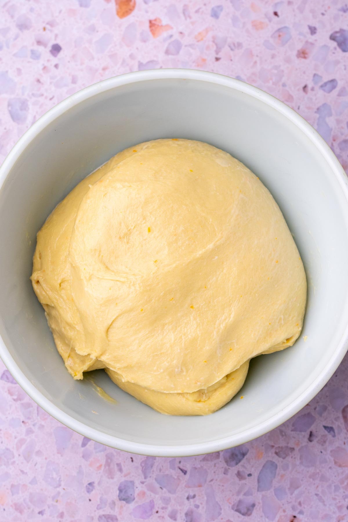 Sourdough concha dough in bowl at the start of fermentation
