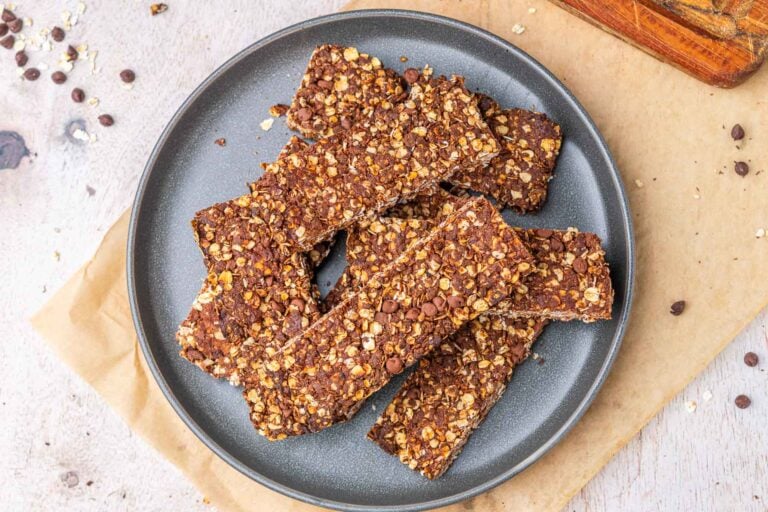 Crunchy sourdough chocolate protein granola bars on a plate.