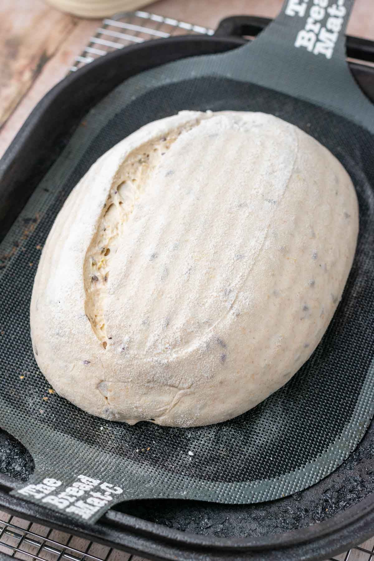 Scored lavender sourdough bread in Challenger Bread pan.